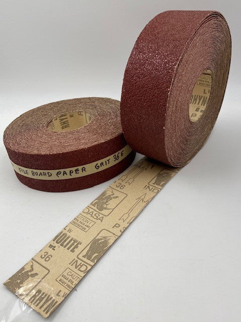 21B. 2 3/4" X 25 YARDS INDASA RED AO RESIN PLAIN BACK HEAVY PAPER ROLL